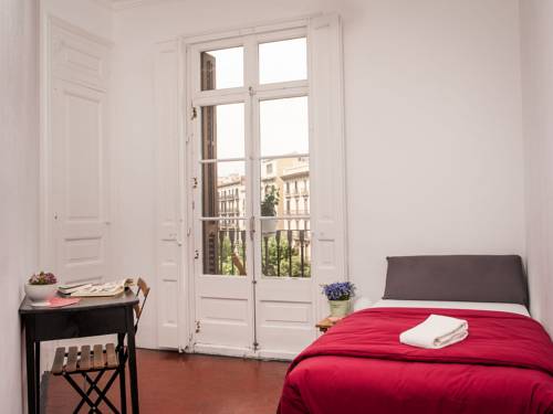 Imagen de la habitación del Hotel El Puchi Barcelona. Foto 11