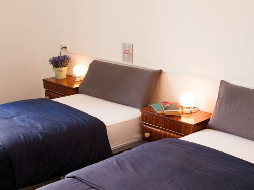 Imagen de la habitación del Hotel El Puchi Barcelona. Foto 13