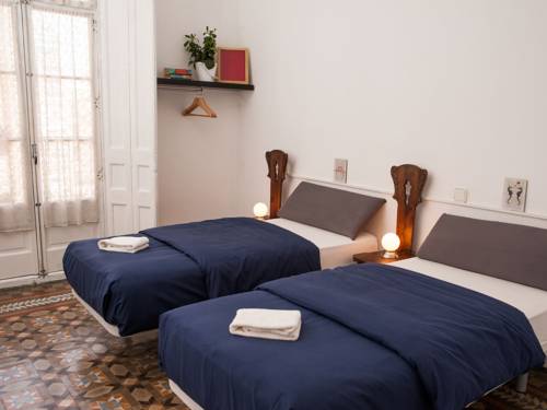 Imagen de la habitación del Hotel El Puchi Barcelona. Foto 14