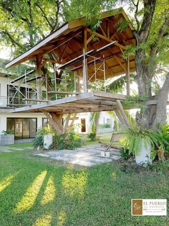 Imagen de la piscina del Hotel El Pueblo De Hermano by Cocotel. Foto 18