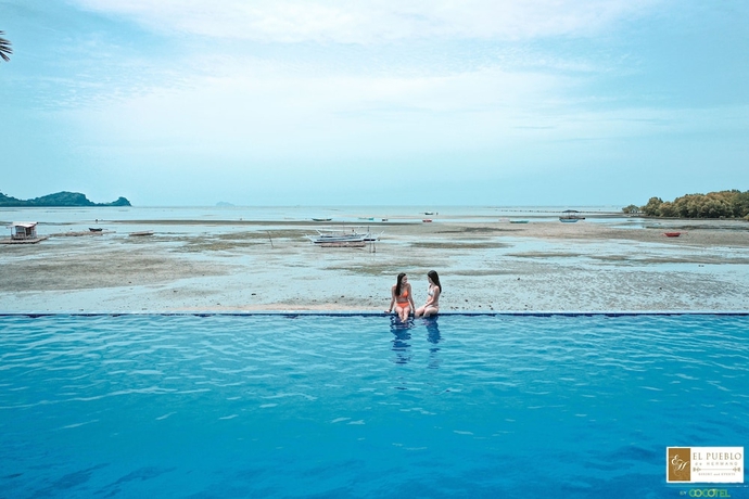 Imagen de la piscina del Hotel El Pueblo De Hermano by Cocotel. Foto 19