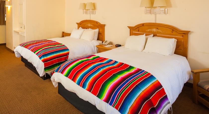 Imagen de la habitación del Hotel El Pueblo Lodge. Foto 3