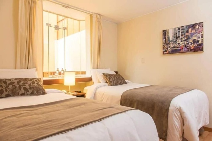 Imagen de la habitación del Hotel El Puente Boutique. Foto 15