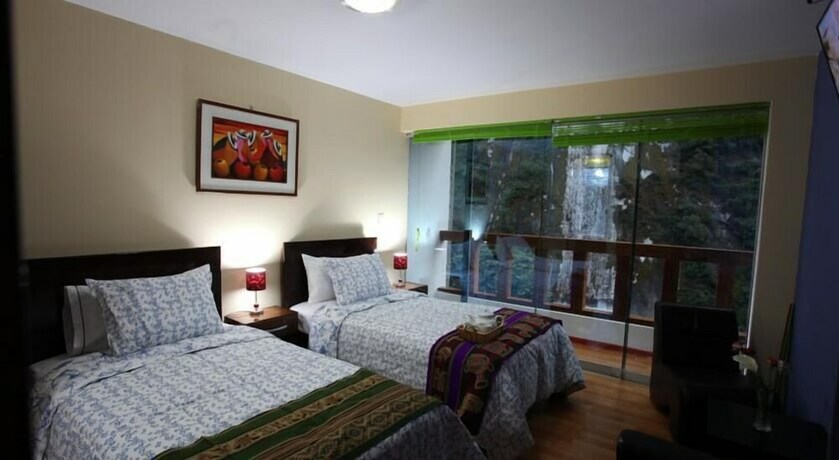 Imagen de la habitación del Hotel El Quetzal Machupicchu. Foto 28
