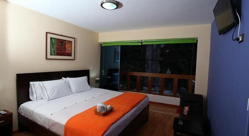 Imagen de la habitación del Hotel El Quetzal Machupicchu. Foto 29