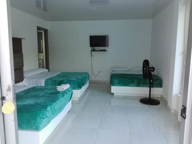 Imagen de la habitación del Hotel El Rancho de Andr&eacute;s. Foto 15