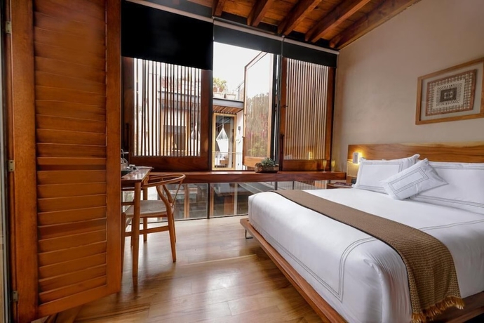 Imagen de la habitación del Hotel El Recinto Luxury. Foto 6
