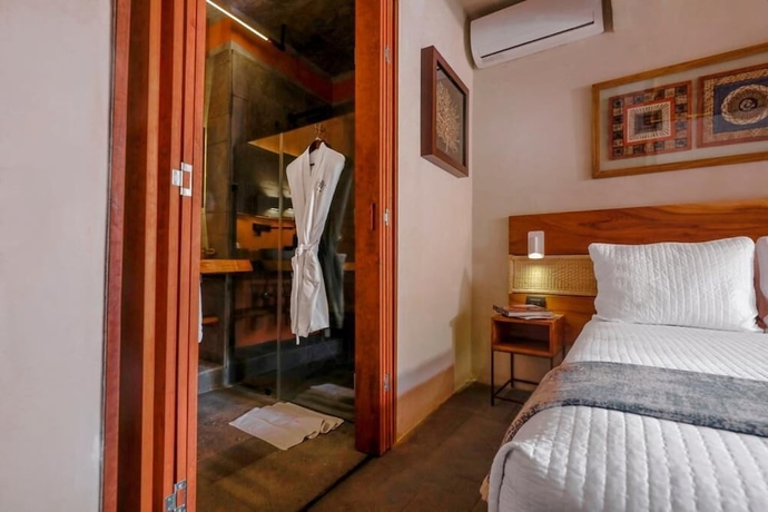 Imagen de la habitación del Hotel El Recinto Luxury. Foto 8