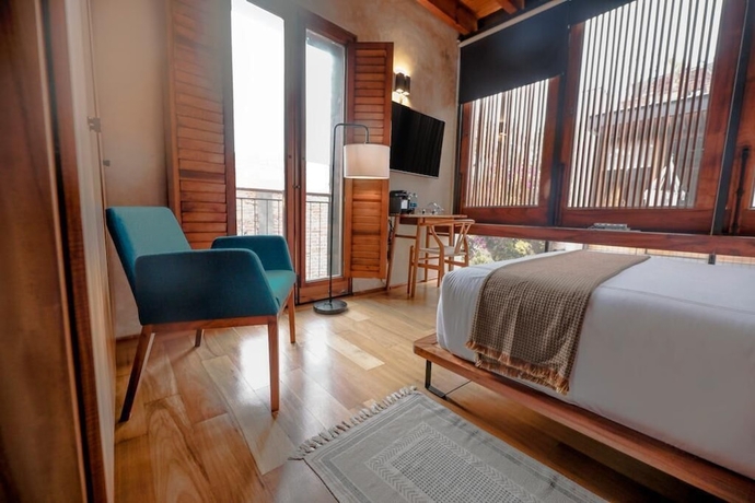 Imagen de la habitación del Hotel El Recinto Luxury. Foto 10