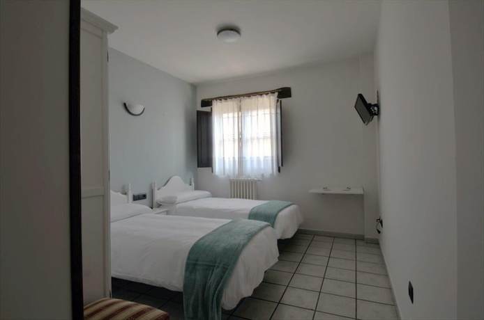 Imagen de la habitación del Hotel El Refugio Hosteria. Foto 15