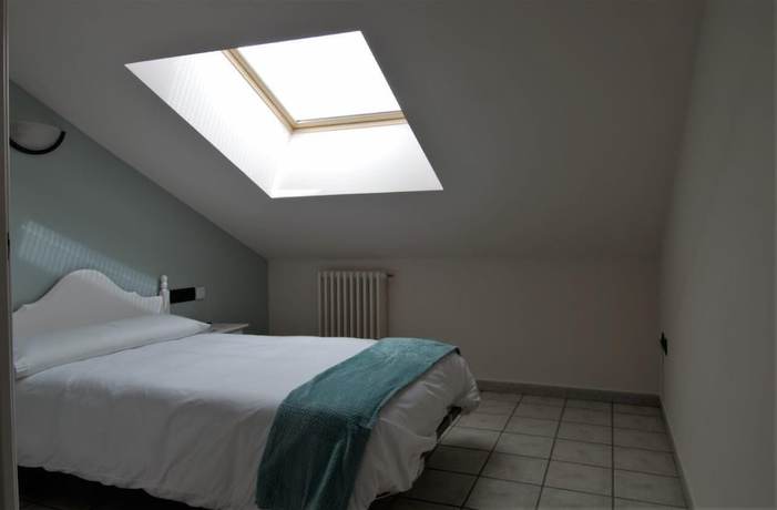 Imagen de la habitación del Hotel El Refugio Hosteria. Foto 17