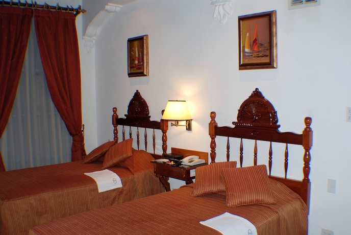 Imagen de la habitación del Hotel El Relicario Del Carmen. Foto 2