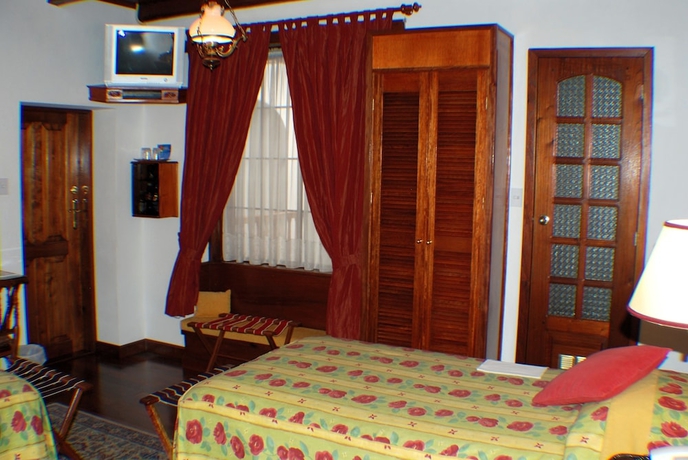 Imagen de la habitación del Hotel El Relicario Del Carmen. Foto 4