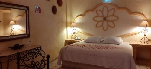 Imagen de la habitación del Hotel El Relicario. Foto 9