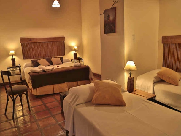 Imagen de la habitación del Hotel El Reposo Del Diablo. Foto 2