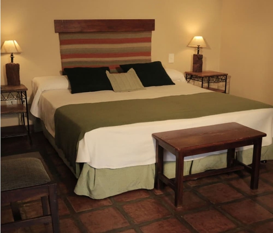 Imagen de la habitación del Hotel El Reposo Del Diablo. Foto 15