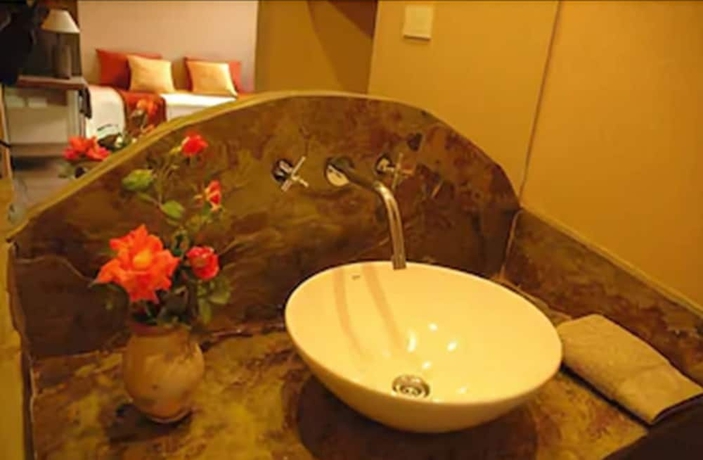 Imagen de la habitación del Hotel El Reposo Del Diablo. Foto 16