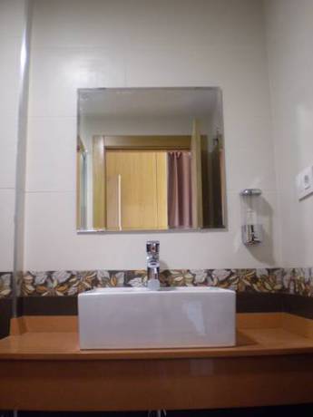 Imagen de la habitación del Hotel El Ribero De Langre. Foto 7