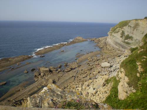 Imagen de la habitación del Hotel El Ribero De Langre. Foto 8