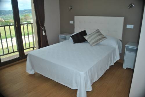 Imagen de la habitación del Hotel El Ribero De Langre. Foto 11