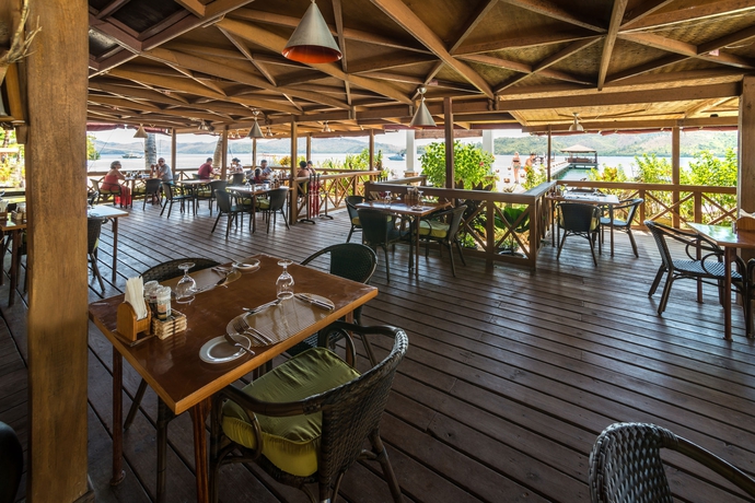 Imagen del bar/restaurante del Hotel El Rio Y Mar Resort. Foto 6