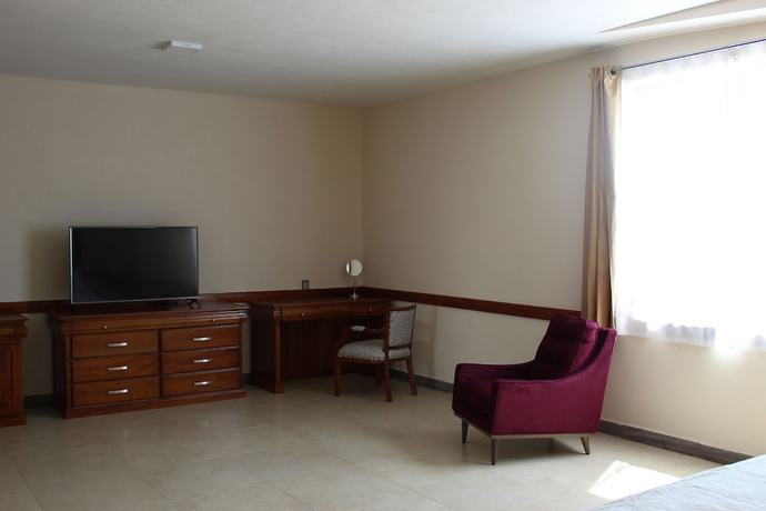 Imagen de la habitación del Hotel El Sabinal Boutique. Foto 13