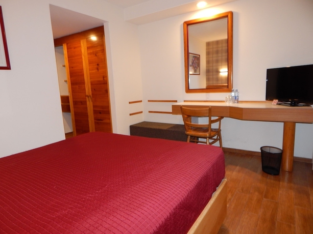 Imagen de la habitación del Hotel El Salvador. Foto 5