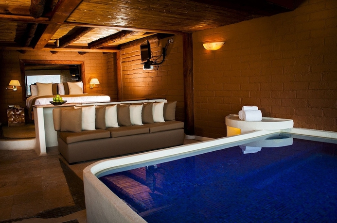 Imagen de la habitación del Hotel El Santuario Resort and Spa. Foto 7