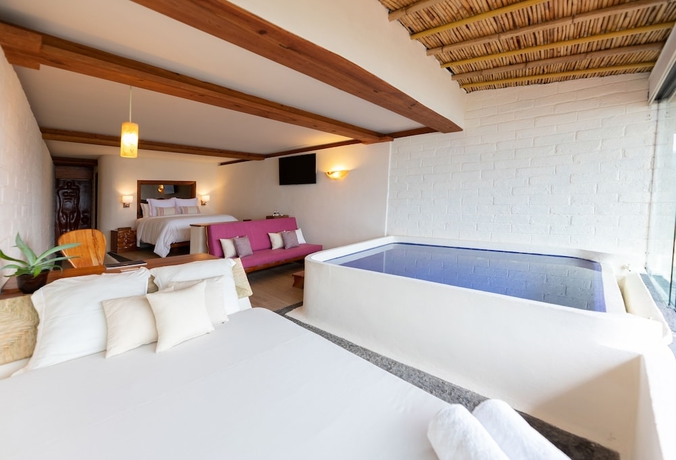 Imagen de la habitación del Hotel El Santuario Resort and Spa. Foto 9