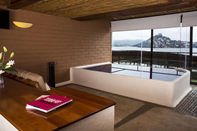 Imagen de la habitación del Hotel El Santuario Resort and Spa. Foto 13