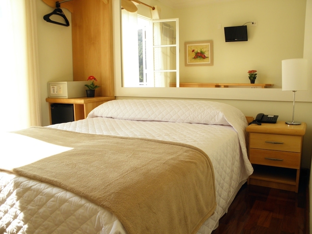 Imagen de la habitación del Hotel El Shadai Park. Foto 7