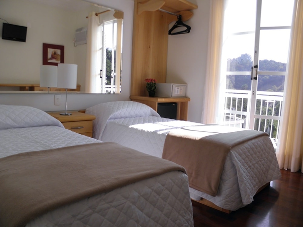 Imagen de la habitación del Hotel El Shadai Park. Foto 10
