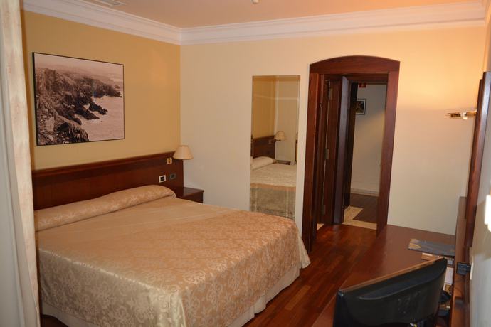 Imagen de la habitación del Hotel El Suizo. Foto 4