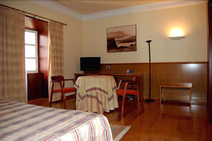 Imagen de la habitación del Hotel El Suizo. Foto 6