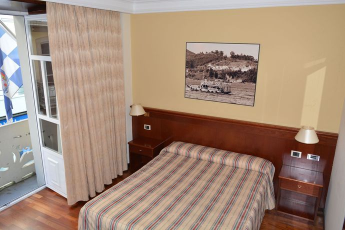 Imagen de la habitación del Hotel El Suizo. Foto 7