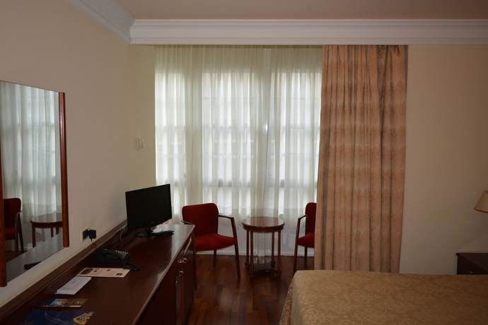 Imagen de la habitación del Hotel El Suizo. Foto 13