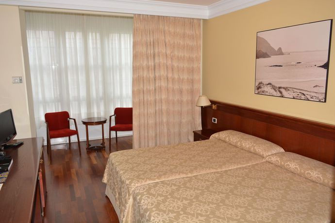 Imagen de la habitación del Hotel El Suizo. Foto 14