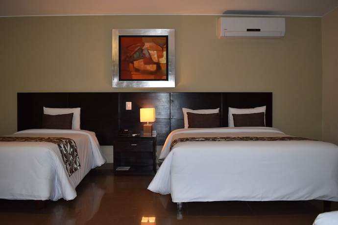 Imagen de la habitación del Hotel El Tambo 1. Foto 4
