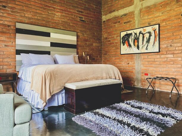 Imagen de la habitación del Hotel El Trapiche Luxury Villa. Foto 15