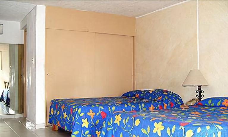 Imagen de la habitación del Hotel El Tropicano. Foto 12