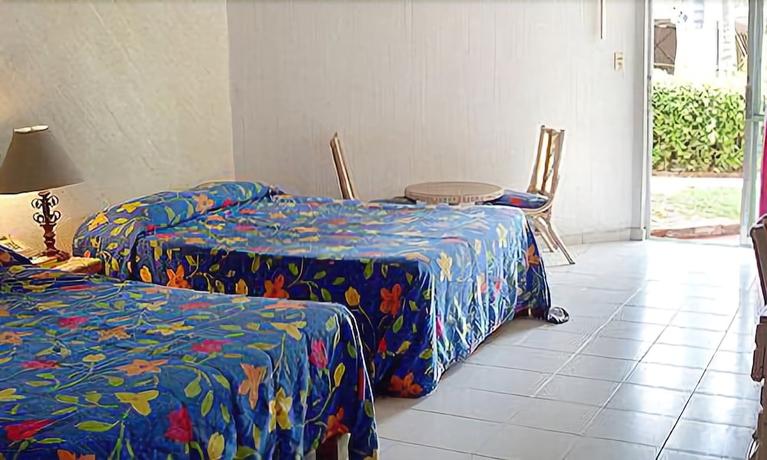 Imagen de la habitación del Hotel El Tropicano. Foto 13