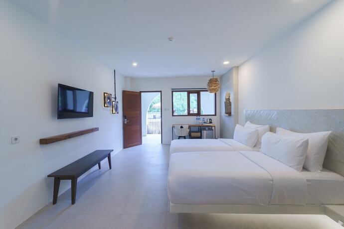 Imagen de la habitación del Hotel El Tropico Boutique. Foto 11