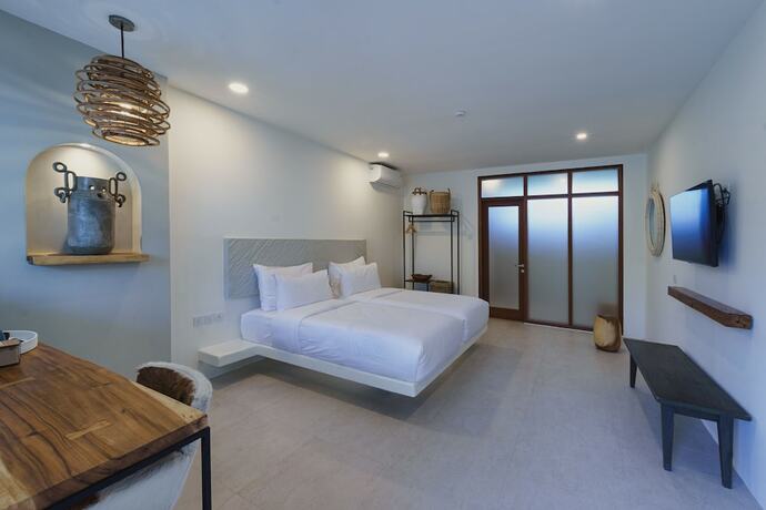 Imagen de la habitación del Hotel El Tropico Boutique. Foto 14