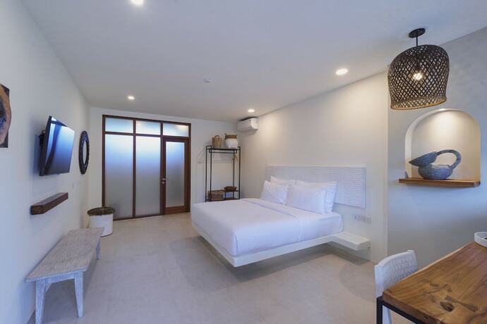 Imagen de la habitación del Hotel El Tropico Boutique. Foto 15