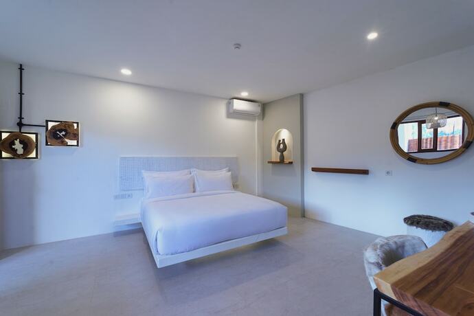 Imagen de la habitación del Hotel El Tropico Boutique. Foto 16