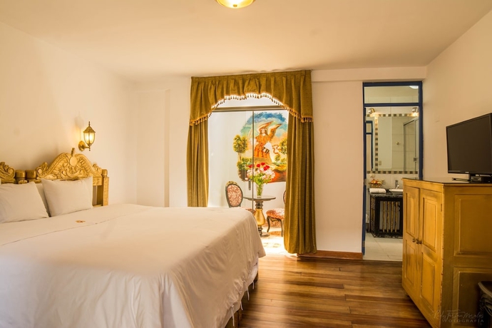 Imagen de la habitación del Hotel El Truco Boutique. Foto 11