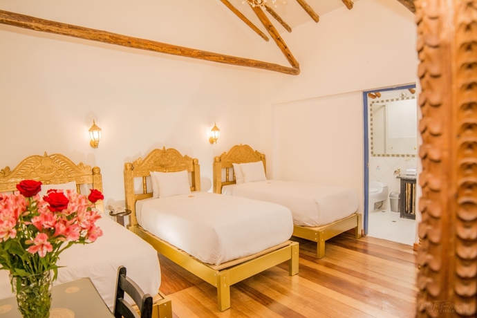 Imagen de la habitación del Hotel El Truco Boutique. Foto 13