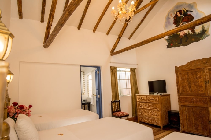 Imagen de la habitación del Hotel El Truco Boutique. Foto 16