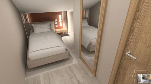 Imagen de la habitación del Hotel El Tujjar. Foto 20