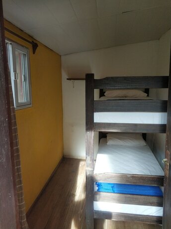 Imagen de la habitación del Hotel El Viajero La Pedrera Hostel and Suites. Foto 10